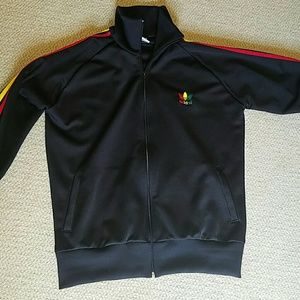 Black Adidas jacket with rasta highlights
